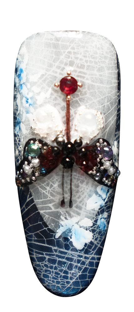 detail of single Blue Morpho press-on nail